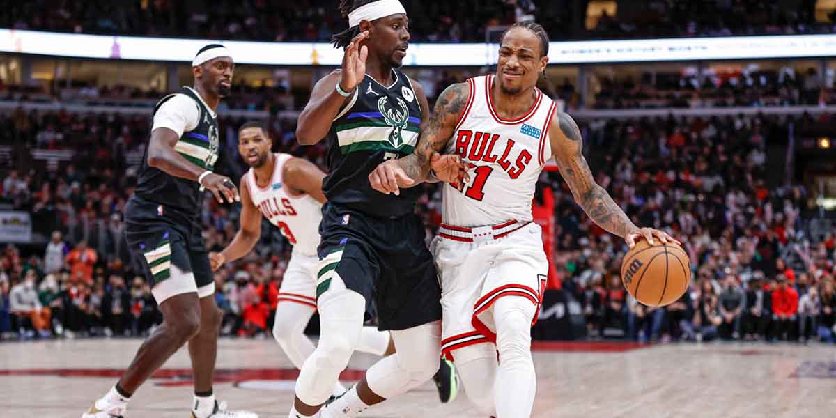 DeMar DeRozan marcato da Jrue Holiday
