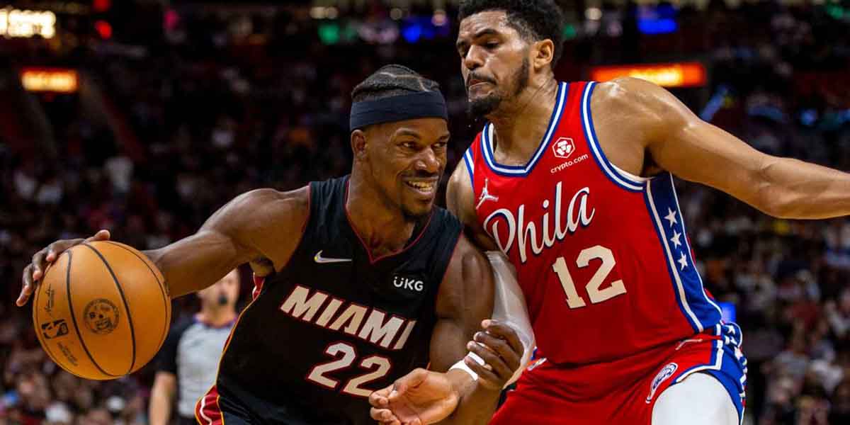 Jimmy Butler attacca Tobias Harris in palleggio