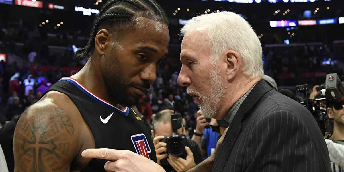 Kawhi Leonard e Gregg Popovich