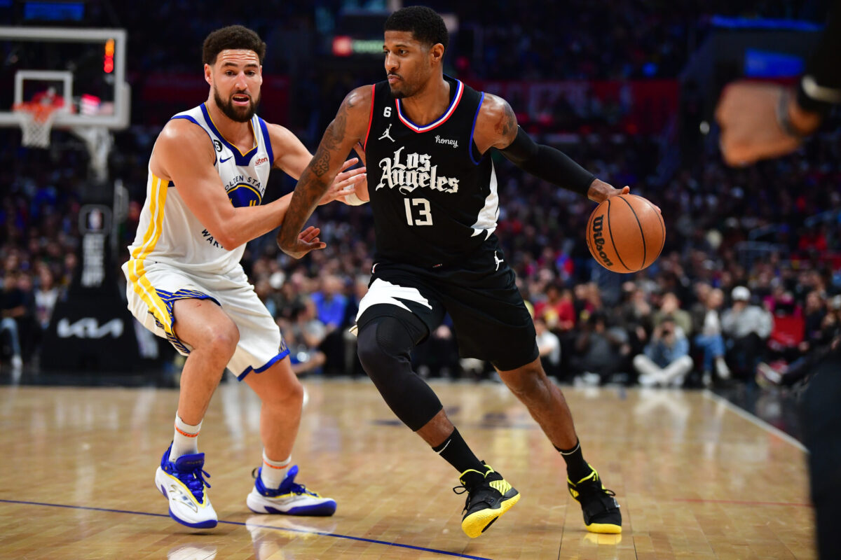 Paul George in palleggio contro Klay Thompson, Warriors-Clippers