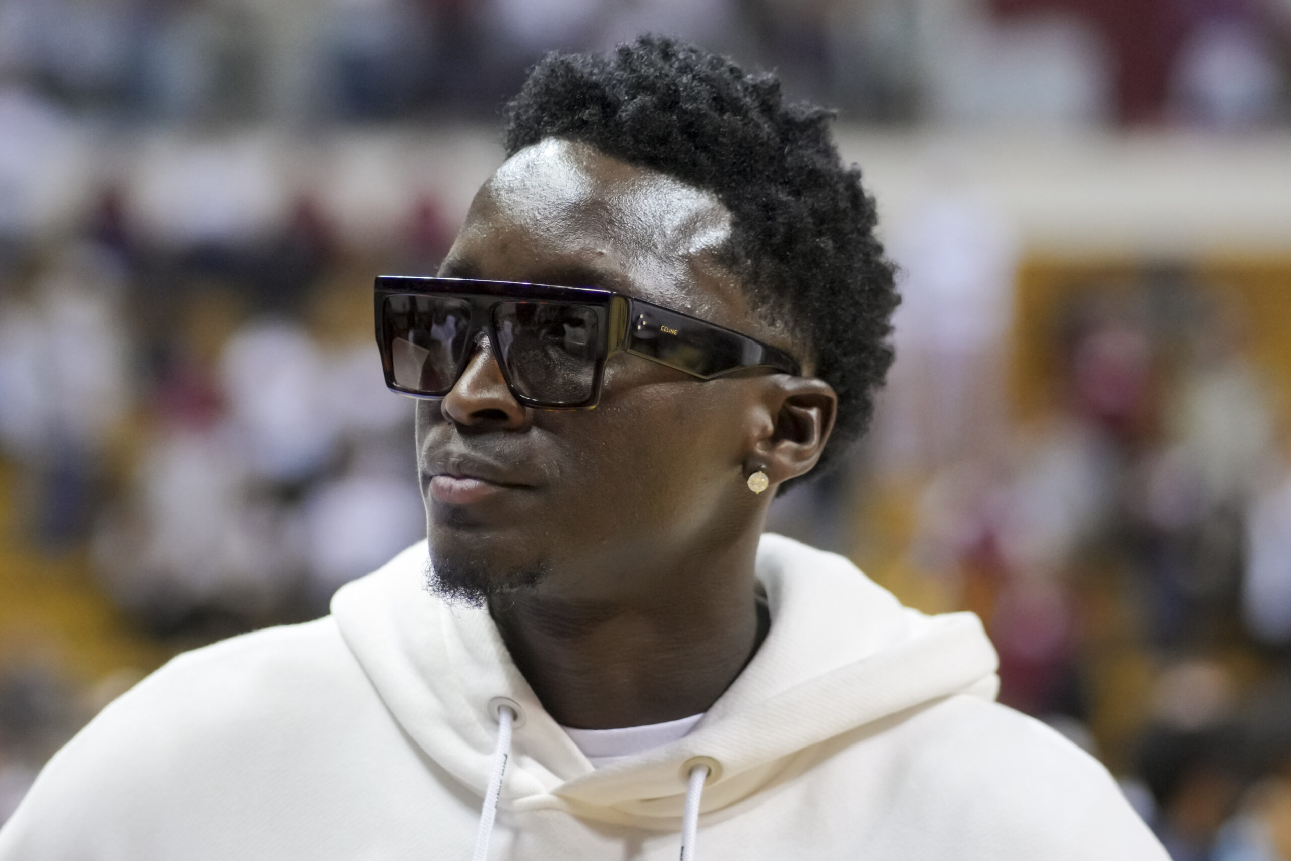 victor oladipo at an NCAA women game